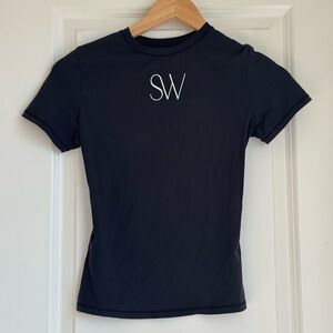 NWT Skims Fits Everybody Short Sleeve
T-Shirt w/ customized logo SMALL